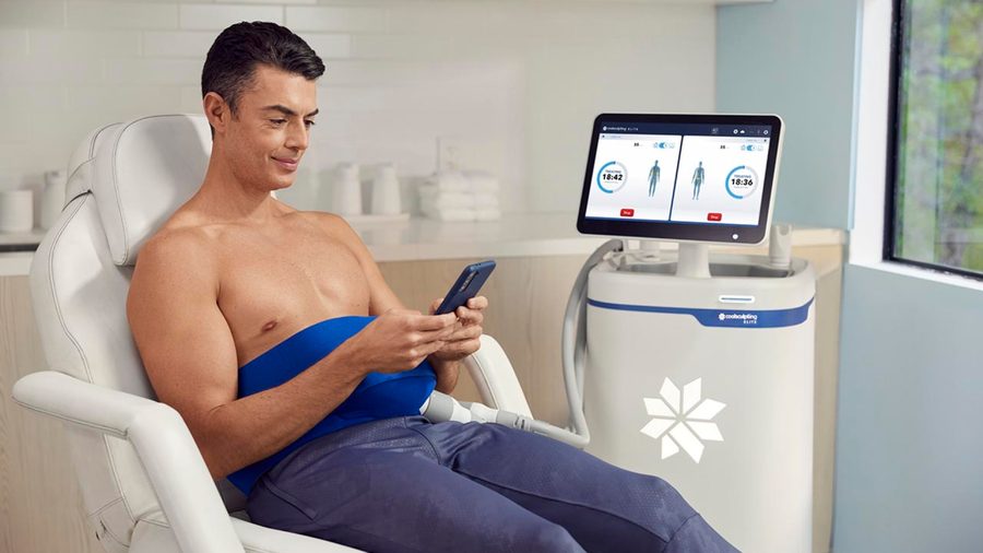 Patient relaxing in the treatment chair during a CoolSculpting Elite session